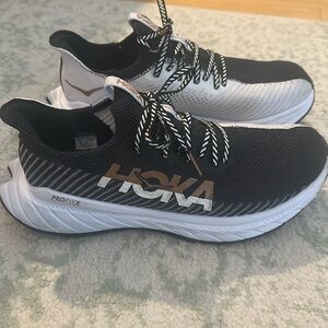 Hoka Black and White Sneakers with Gold Accents